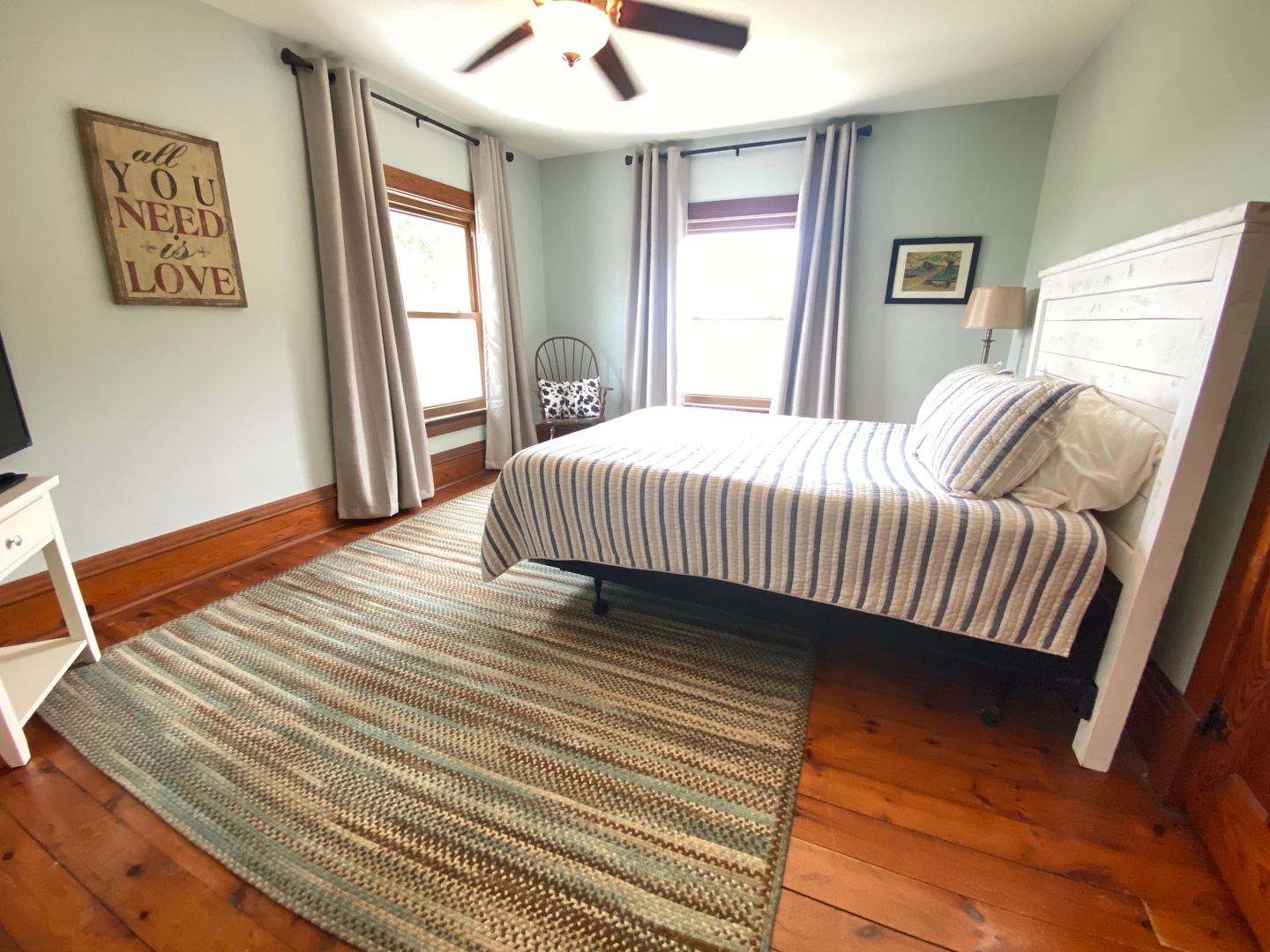 174 Kilgore Road Dixon, IL 61021 - Photo 37 of 55 a bedroom with a bed and wooden floor