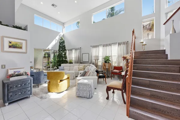 a living room with furniture and a table