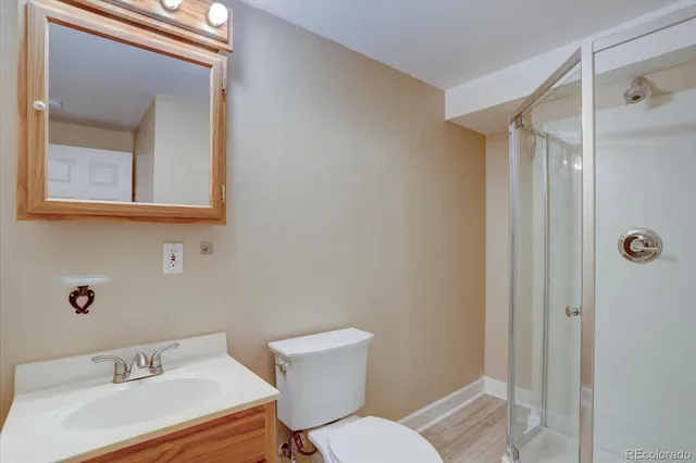 a view of a house with a yard and plants