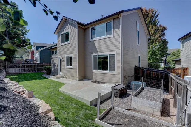 a view of a pathway with a garden