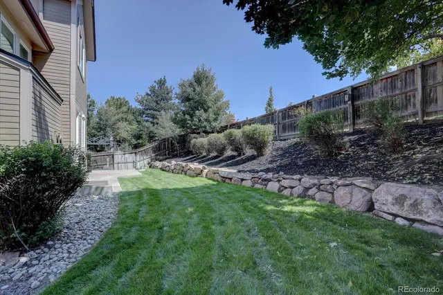 a bathroom with a black and white checkered floor
