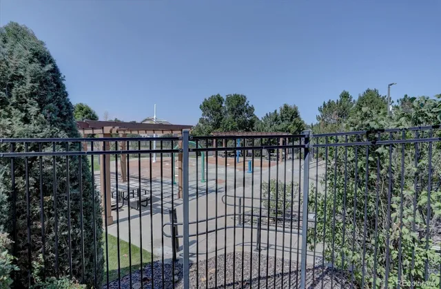 a view of a gate and fence