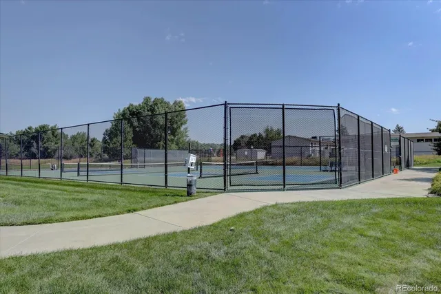 a view of a golf course with a lake