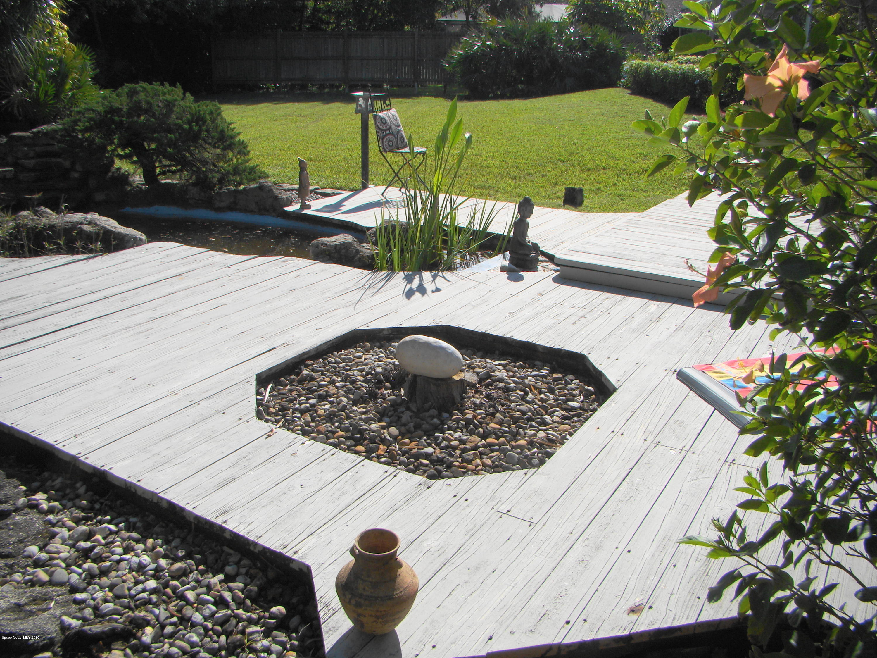 4485 Canard Road Melbourne, FL 32934 - Photo 28 of 34 IMAGINE A FIRE PIT RIGHT HERE!
