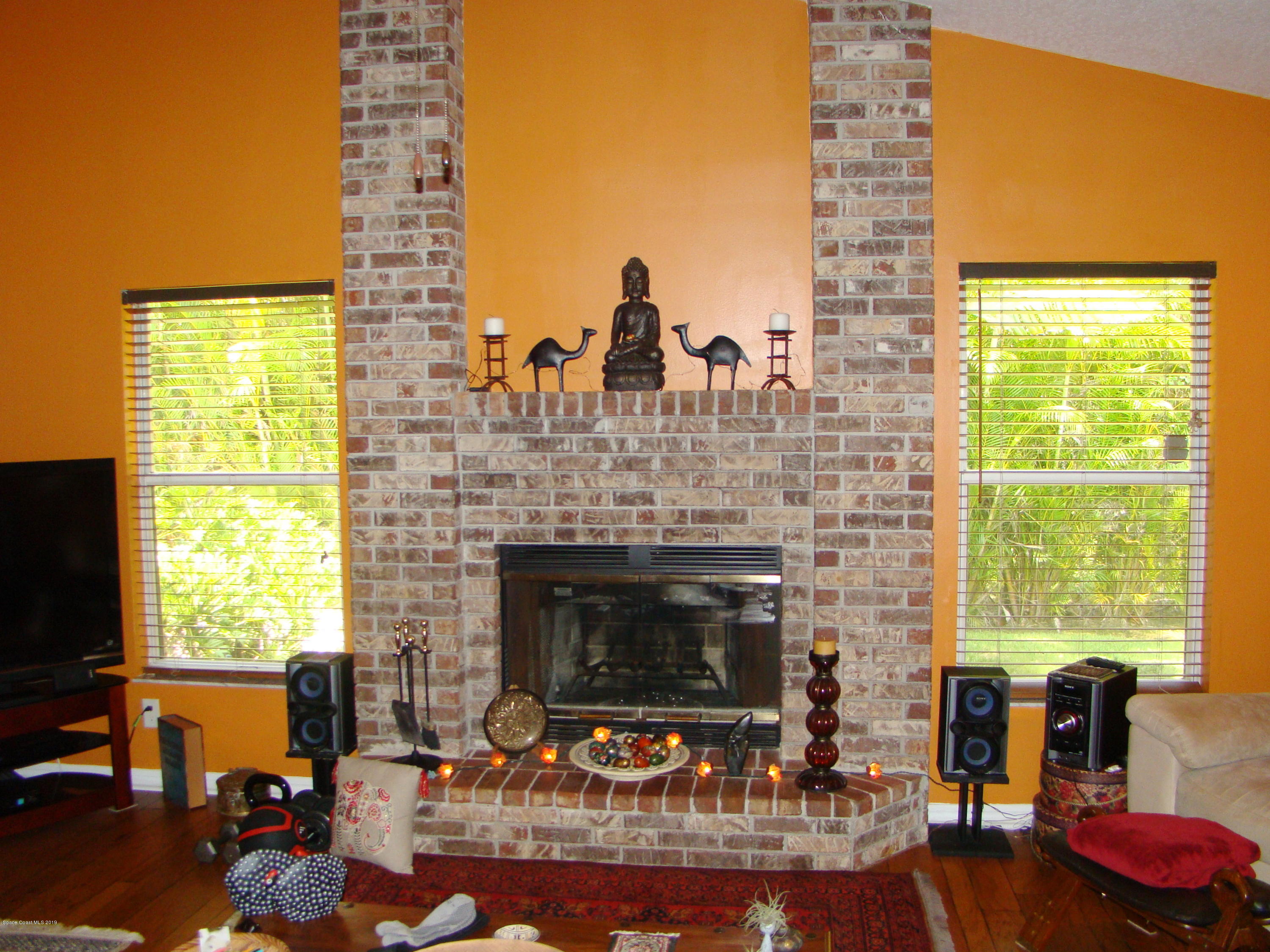 4485 Canard Road Melbourne, FL 32934 - Photo 6 of 34 NATURE'S ART EACH SIDE OF FAMILY ROOM!!