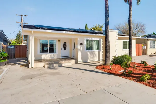 a front view of a house with a porch