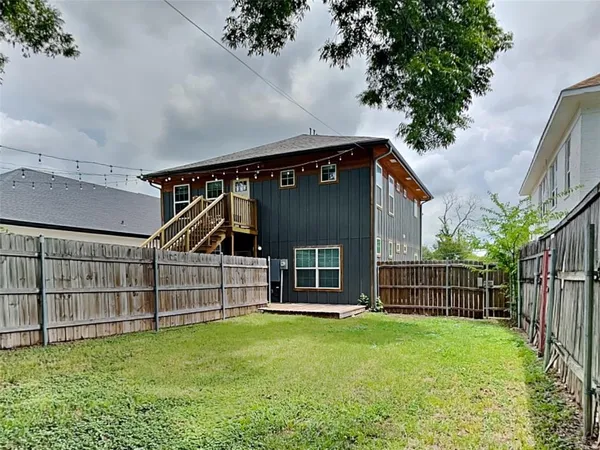 a view of backyard with deck