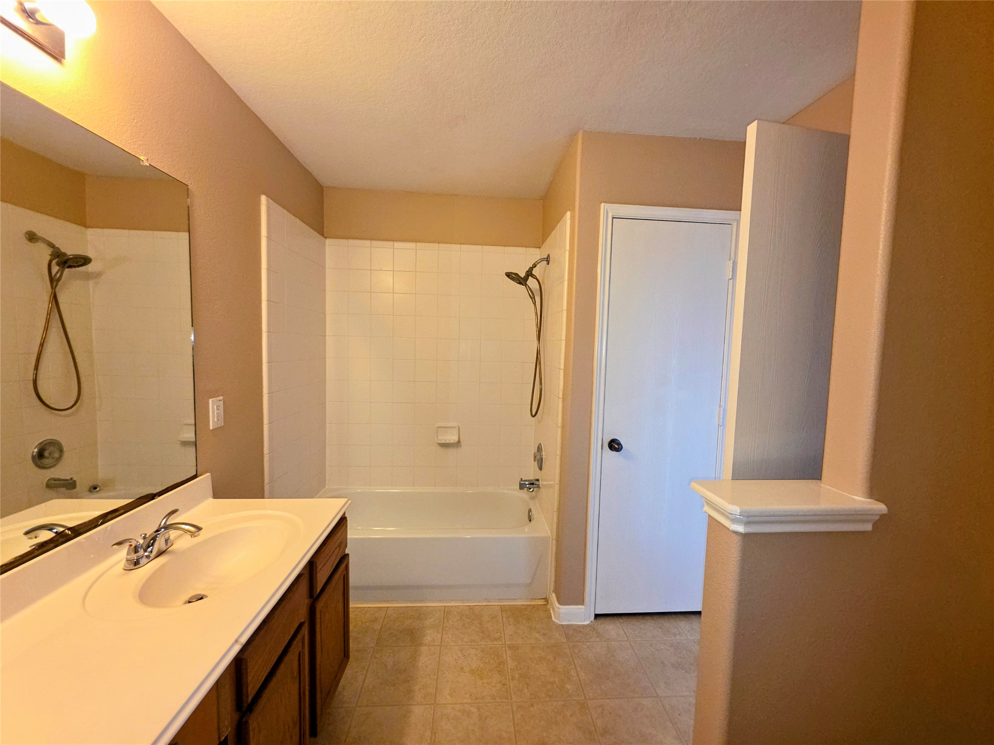 24235 Stargazer Point Spring, TX 77373 - Photo 19 of 21 a bathroom with a sink a toilet and shower