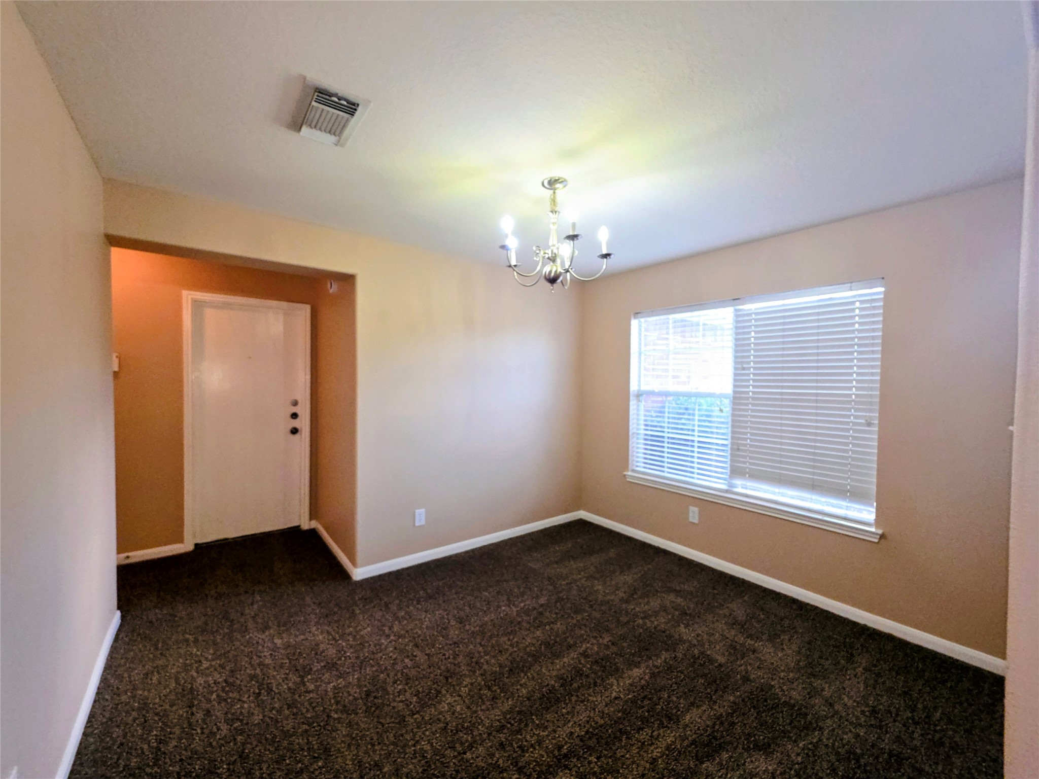 24235 Stargazer Point Spring, TX 77373 - Photo 9 of 21 a view of an empty room with a window