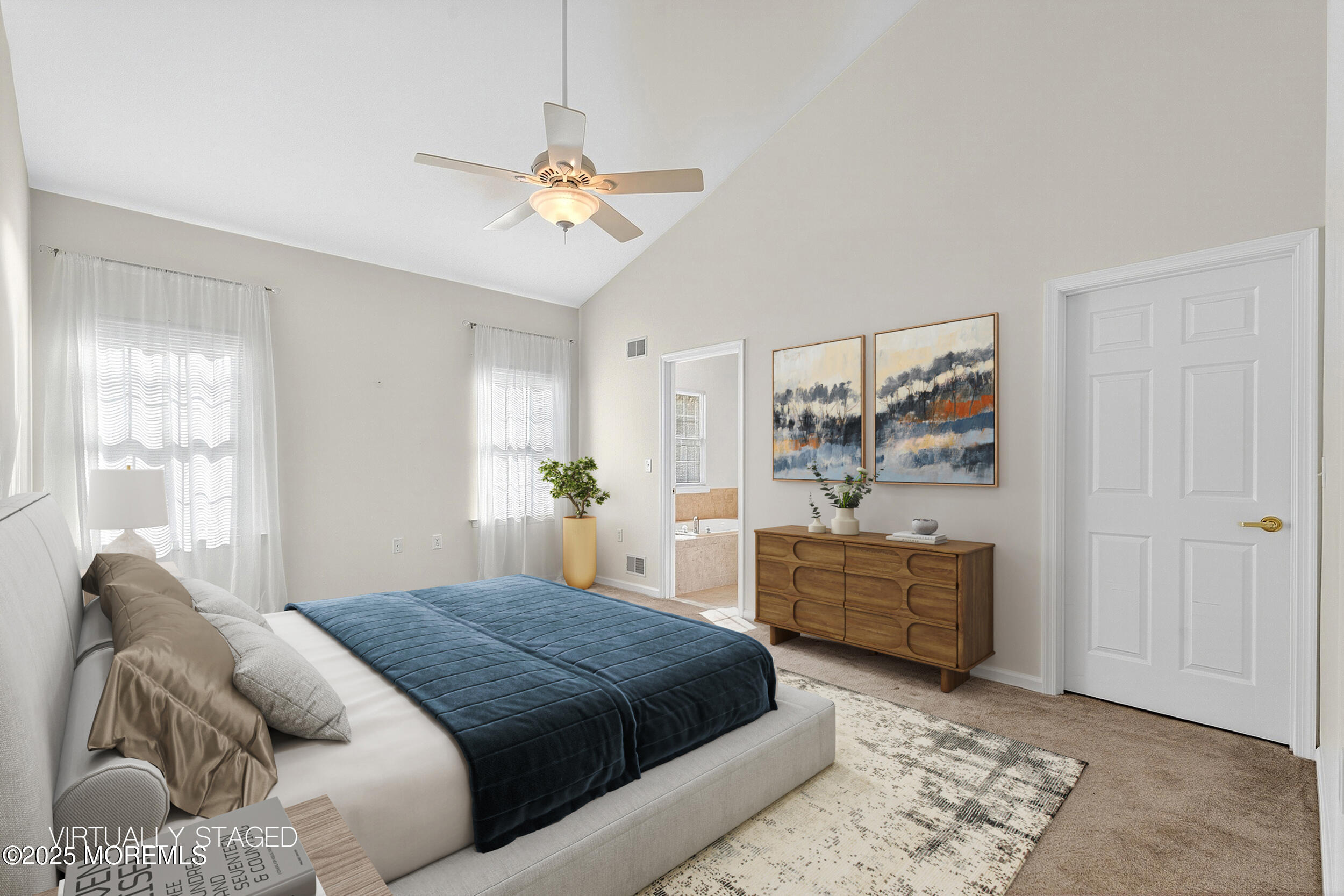 79 Spring Lake Boulevard Waretown, NJ 08758 - Photo 21 of 47 a spacious bedroom with a bed and ceiling fan