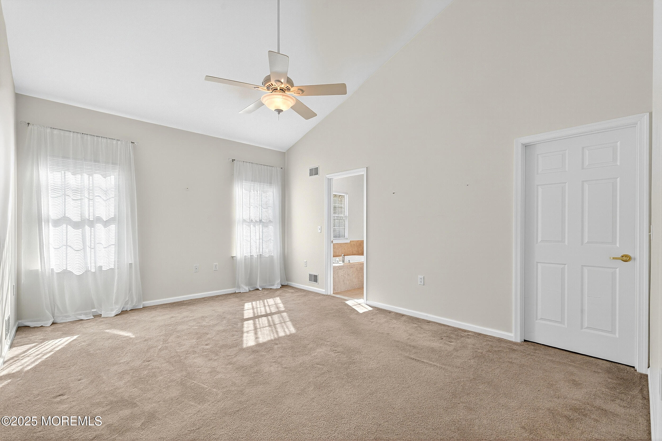 79 Spring Lake Boulevard Waretown, NJ 08758 - Photo 22 of 47 a view of an empty room with a window