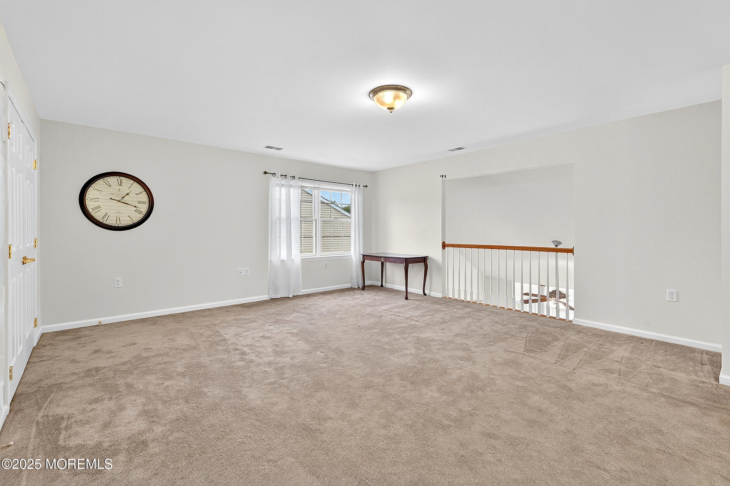 79 Spring Lake Boulevard Waretown, NJ 08758 - Photo 31 of 47 a view of an empty room with a window
