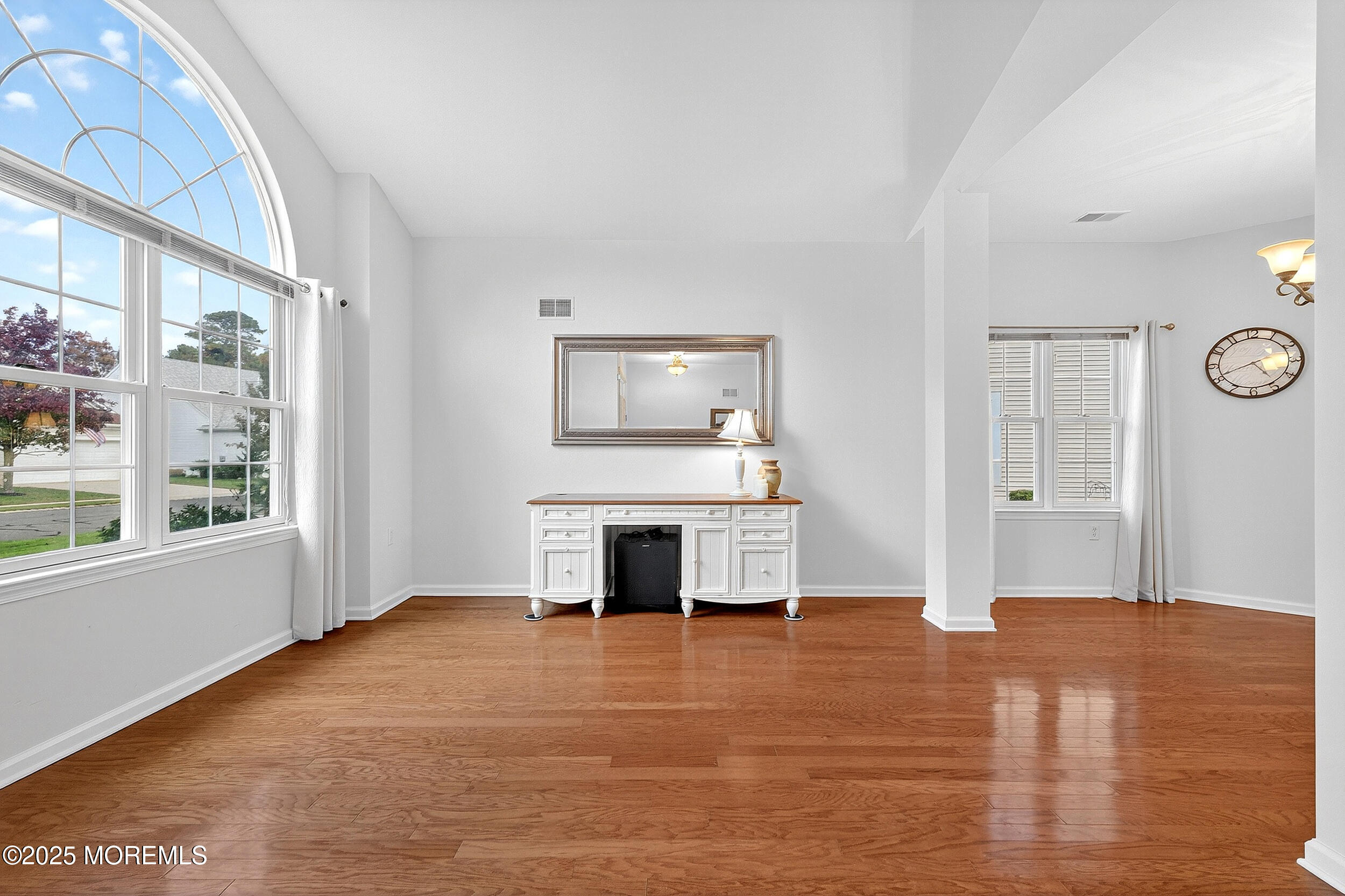 79 Spring Lake Boulevard Waretown, NJ 08758 - Photo 5 of 47 a view of livingroom with furniture window and wooden floor