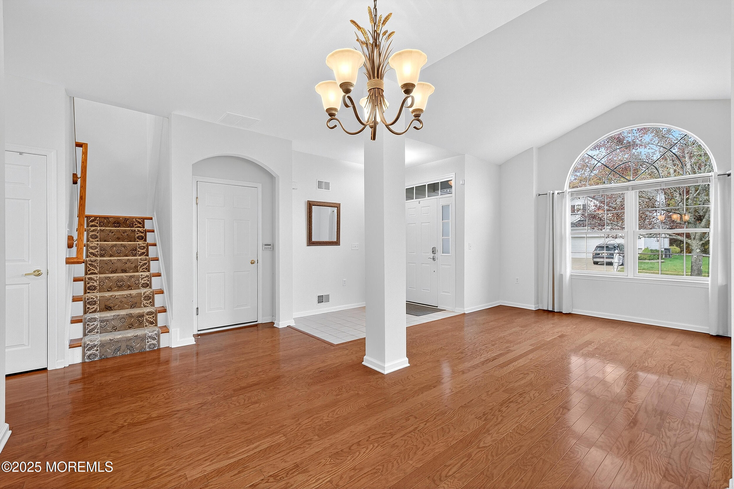 79 Spring Lake Boulevard Waretown, NJ 08758 - Photo 8 of 47 wooden floor in an empty room with a window