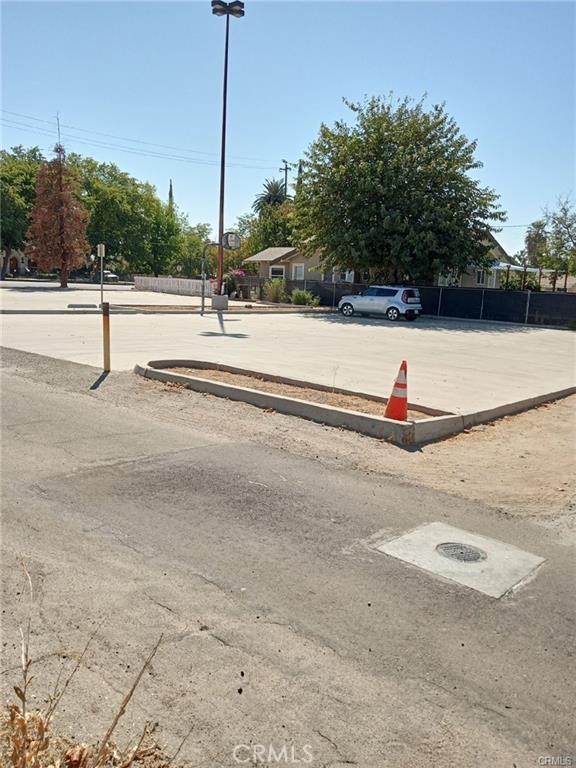 1810 Baker Street Bakersfield, CA 93305 - Photo 3 of 5 a view of a tennis ground with palm trees