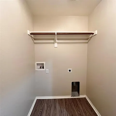 a view of small space with racks on the wall