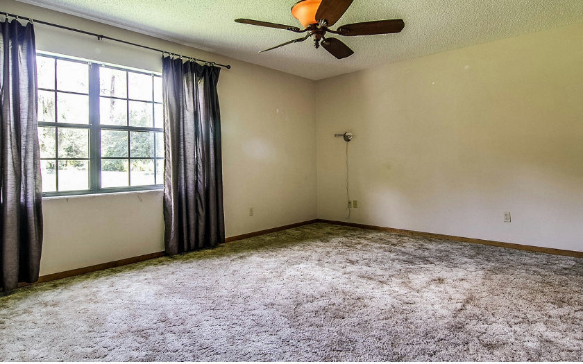 75043 Edwards Road Yulee, FL 32097 - Photo 11 of 21 an empty room with a window