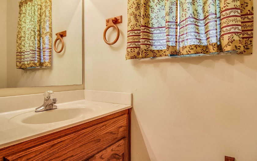 75043 Edwards Road Yulee, FL 32097 - Photo 12 of 21 a bathroom with a sink and a mirror