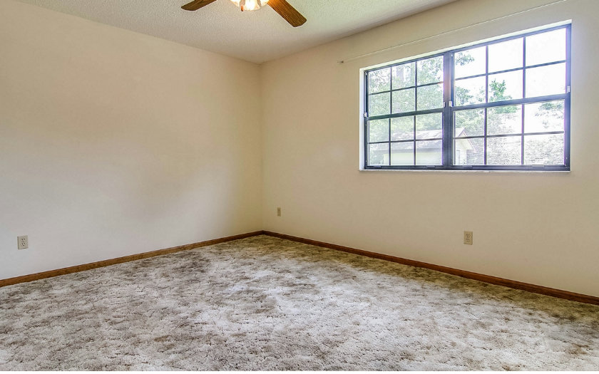 75043 Edwards Road Yulee, FL 32097 - Photo 15 of 21 an empty room with a window