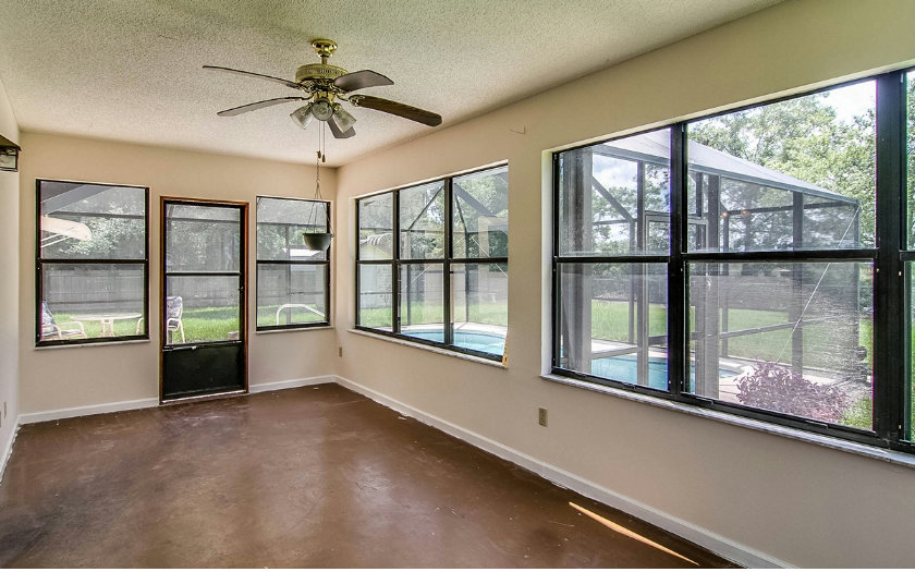 75043 Edwards Road Yulee, FL 32097 - Photo 16 of 21 a view of an empty room with a window