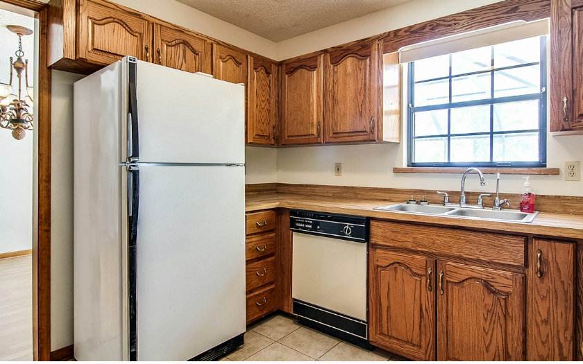 75043 Edwards Road Yulee, FL 32097 - Photo 19 of 21 a white refrigerator freezer sitting inside of a kitchen