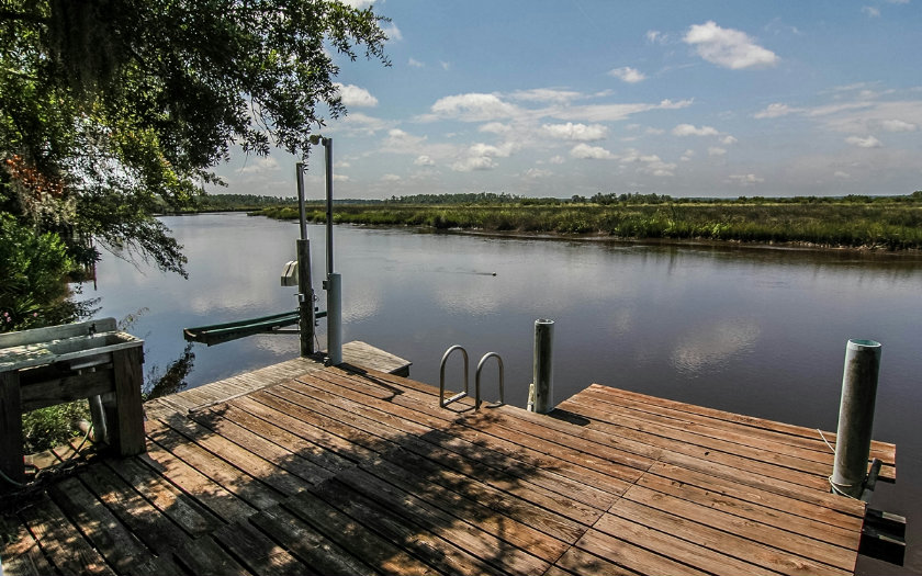 75043 Edwards Road Yulee, FL 32097 - Photo 3 of 21 a view of a lake