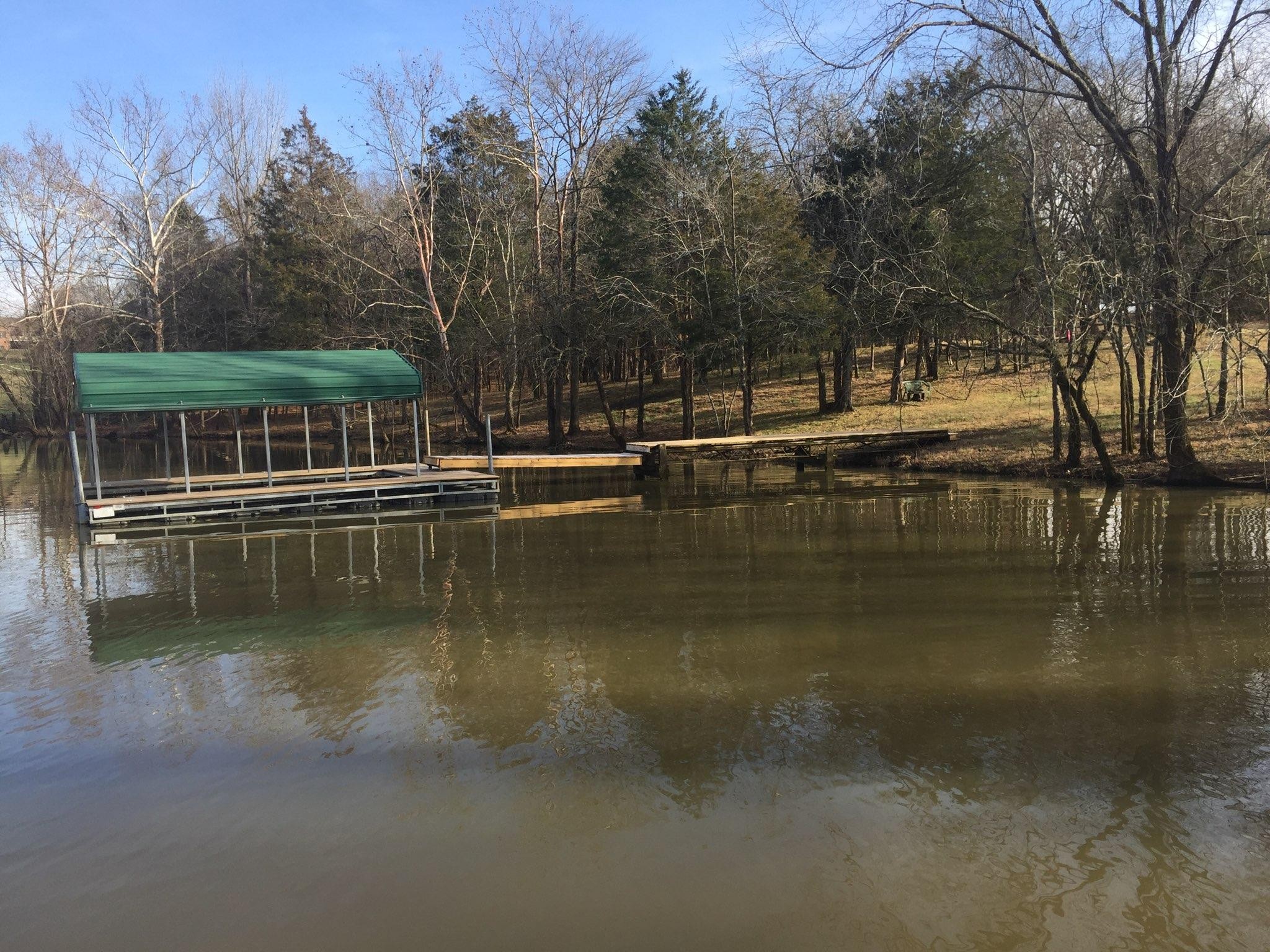 6 Flippen Road Lebanon, TN 37087 - Photo 22 of 24 a view of a lake with trees in the background