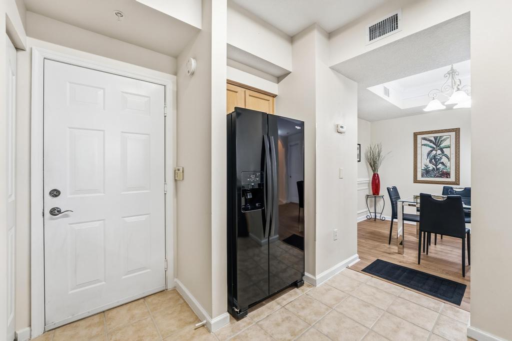 125 Galicia Way, Unit 102 Jupiter, FL 33458 - Photo 30 of 31 Access to Garage & Laundry