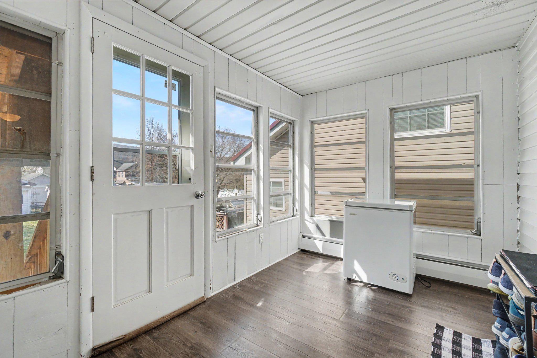 418 Elizabeth Street Williamstown, PA 17098 - Photo 12 of 34 a view of empty room with wooden floor and fan