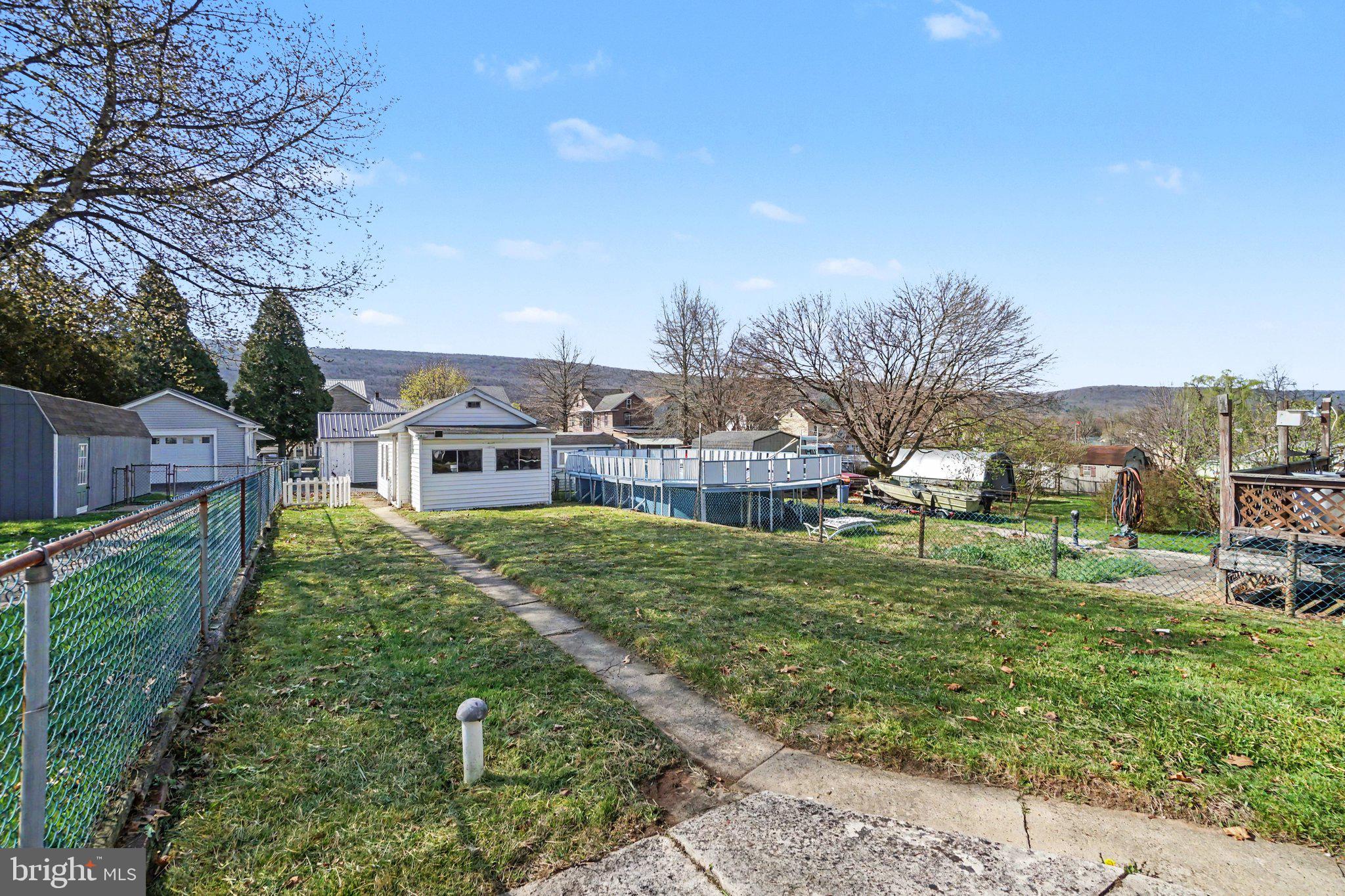 418 Elizabeth Street Williamstown, PA 17098 - Photo 26 of 34 a view of a garden with a house