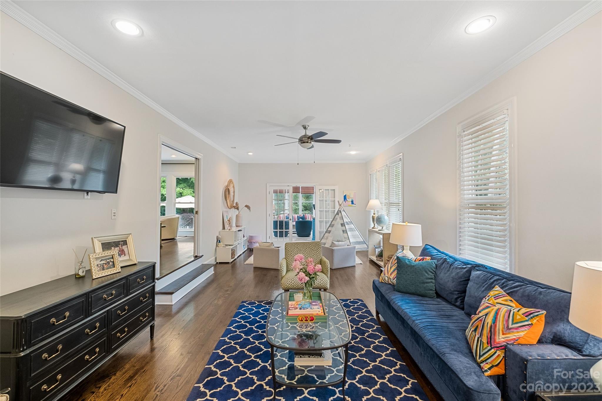 5013 Morrowick Road Charlotte, NC 28226 - Photo 14 of 48 a living room with furniture and wooden floor
