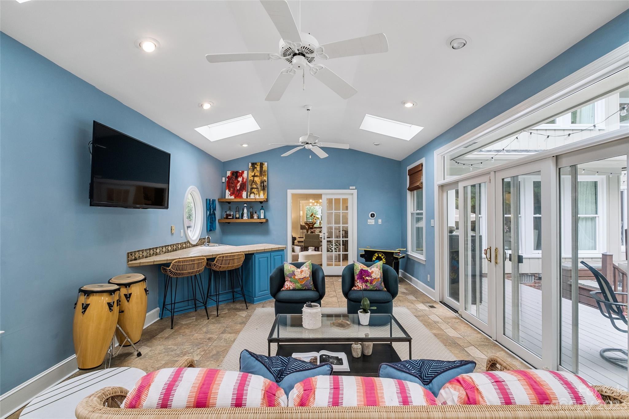 5013 Morrowick Road Charlotte, NC 28226 - Photo 17 of 48 a living room with furniture and a flat screen tv