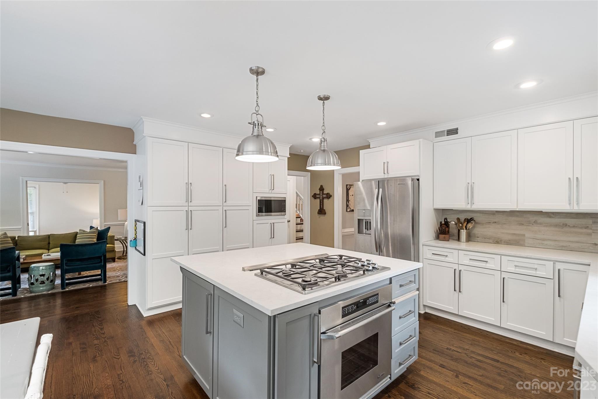 5013 Morrowick Road Charlotte, NC 28226 - Photo 20 of 48 a kitchen with a sink stove and refrigerator
