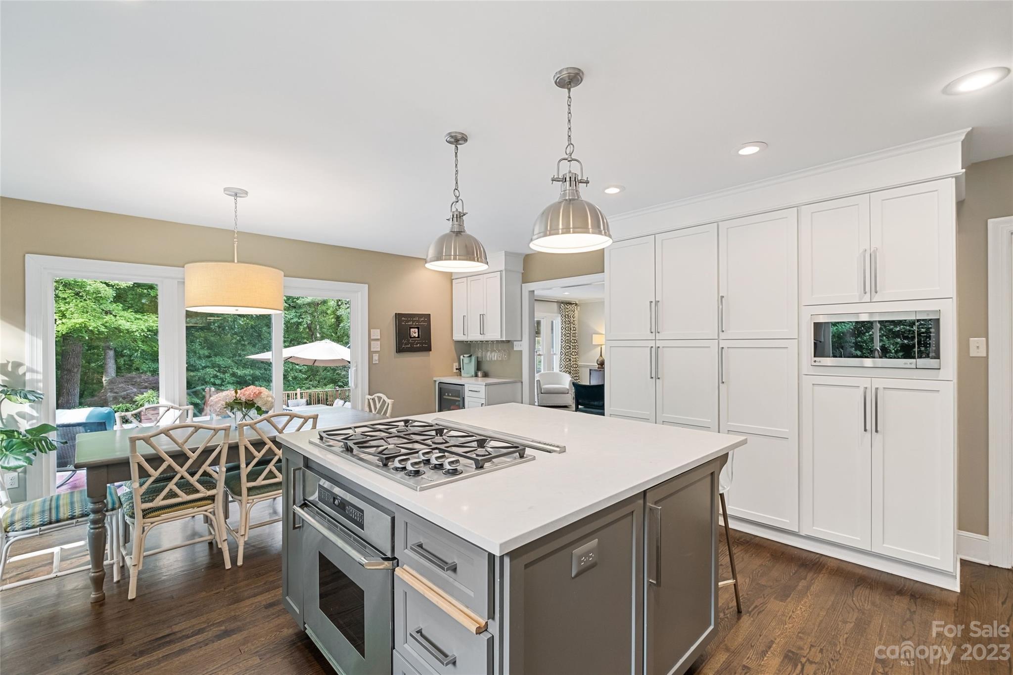 5013 Morrowick Road Charlotte, NC 28226 - Photo 22 of 48 a open kitchen with stainless steel appliances granite countertop a stove and refrigerator