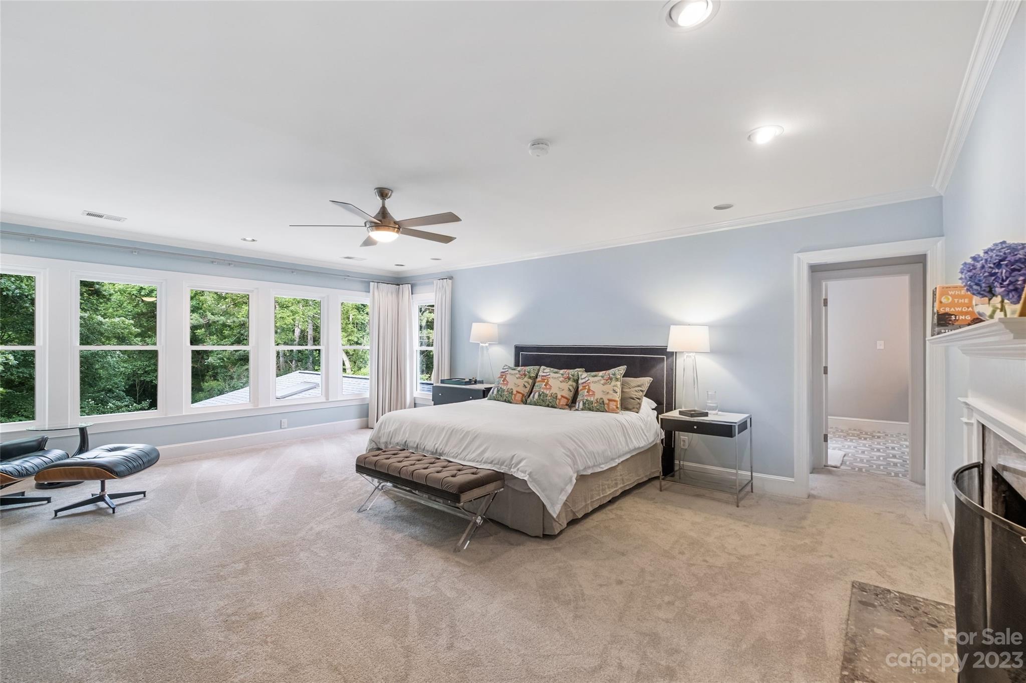 5013 Morrowick Road Charlotte, NC 28226 - Photo 24 of 48 a spacious bedroom with a bed and a large window