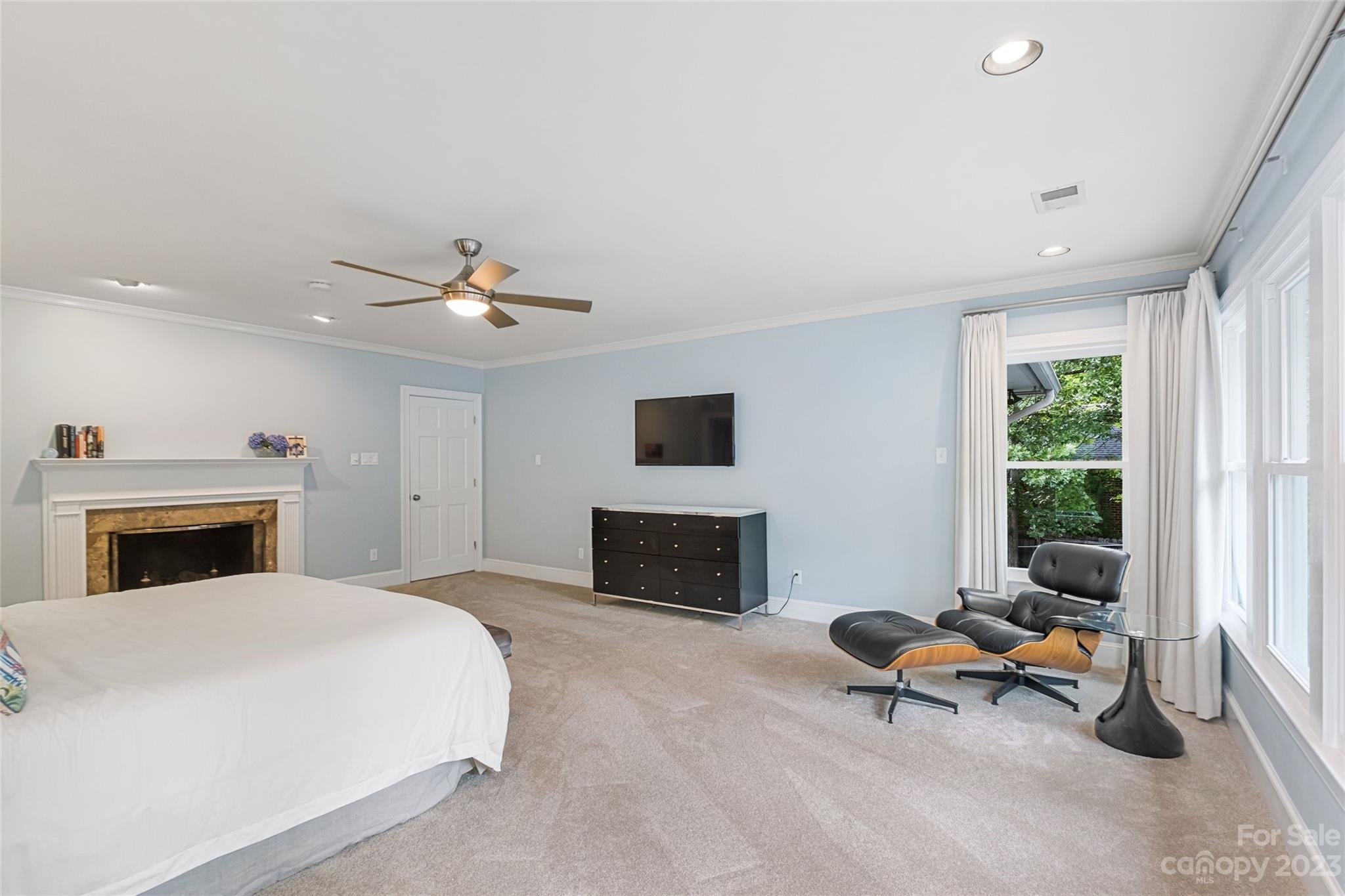 5013 Morrowick Road Charlotte, NC 28226 - Photo 25 of 48 a bedroom with furniture and a fireplace