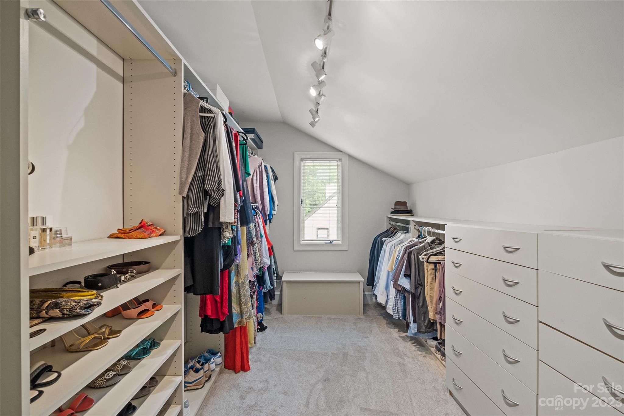 5013 Morrowick Road Charlotte, NC 28226 - Photo 29 of 48 a view of walk in closet with clothes and shoes