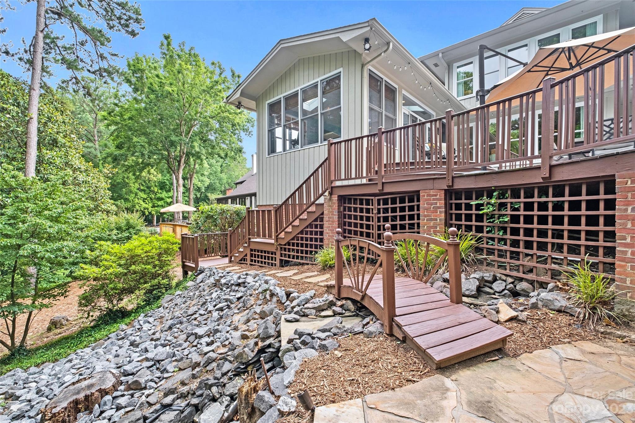 5013 Morrowick Road Charlotte, NC 28226 - Photo 42 of 48 front view of a house with a bench
