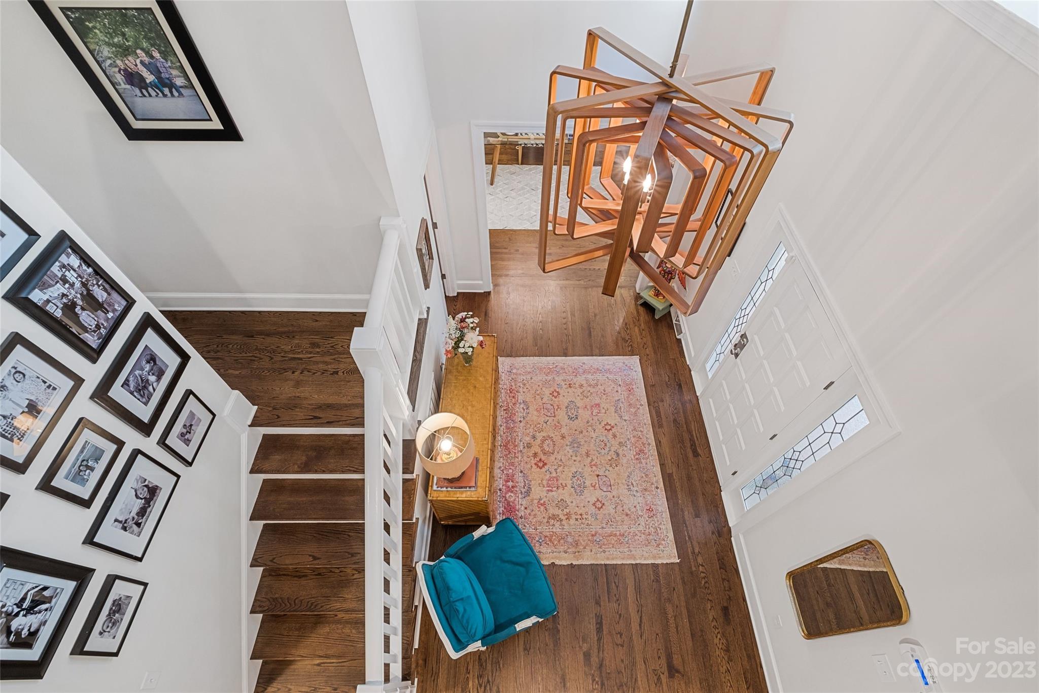 5013 Morrowick Road Charlotte, NC 28226 - Photo 6 of 48 a view of an entryway with wooden floor
