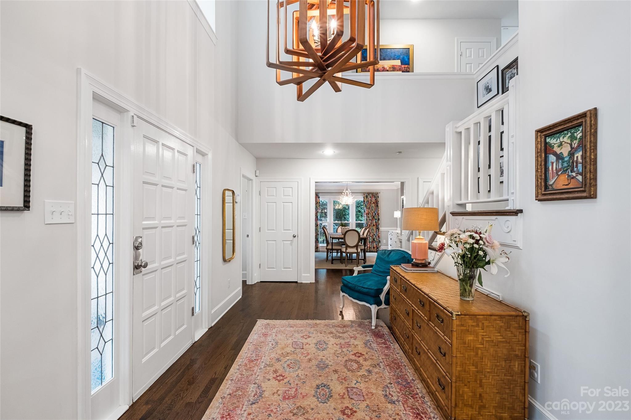 5013 Morrowick Road Charlotte, NC 28226 - Photo 7 of 48 a hallway with furniture and a rug