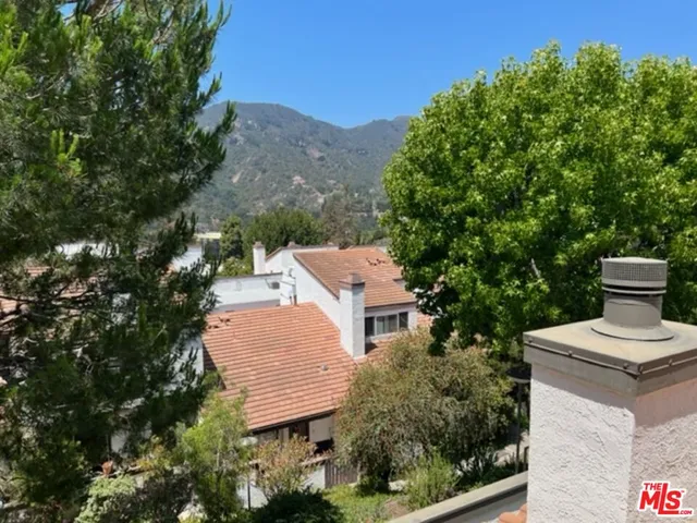 a bathroom with a double vanity sink and mirror