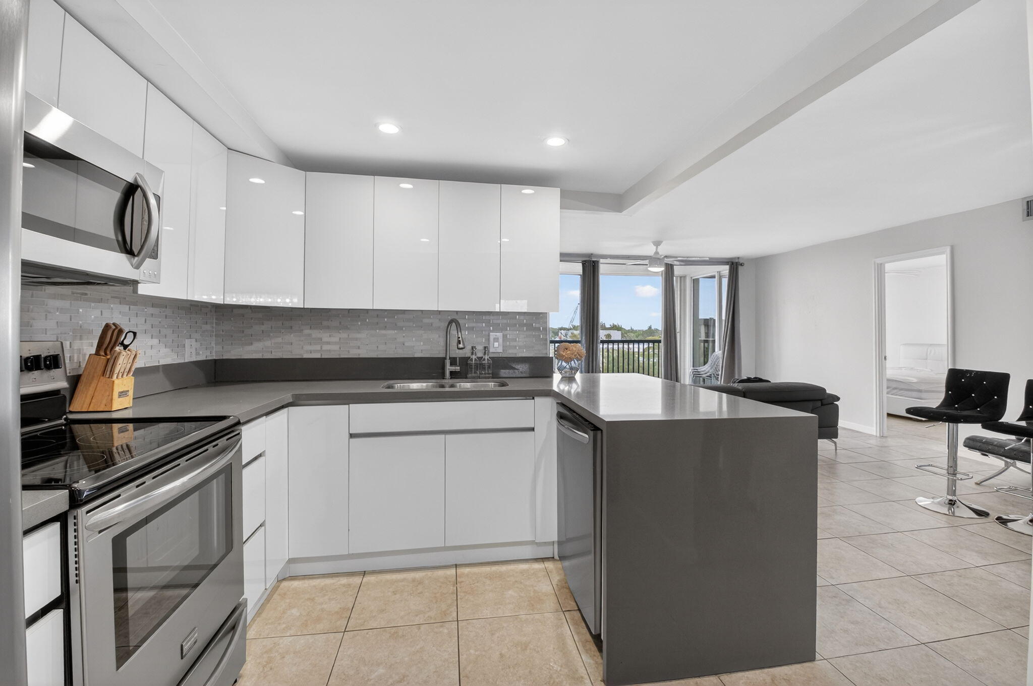 5280 Northwest 2nd Avenue, Unit PH17 Boca Raton, FL 33487 - Photo 11 of 35 11 Kitchen 3