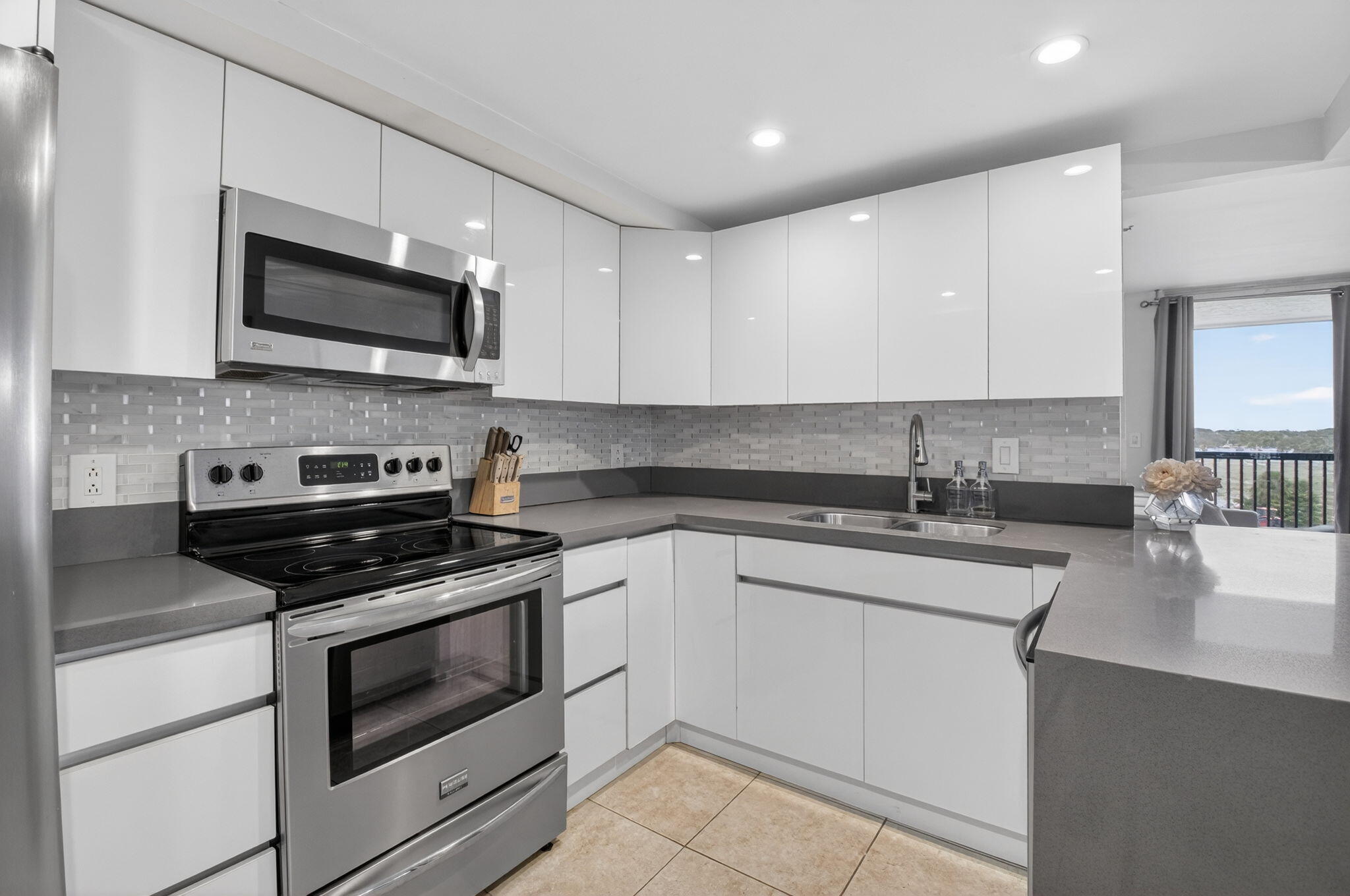 5280 Northwest 2nd Avenue, Unit PH17 Boca Raton, FL 33487 - Photo 12 of 35 12 Kitchen 4