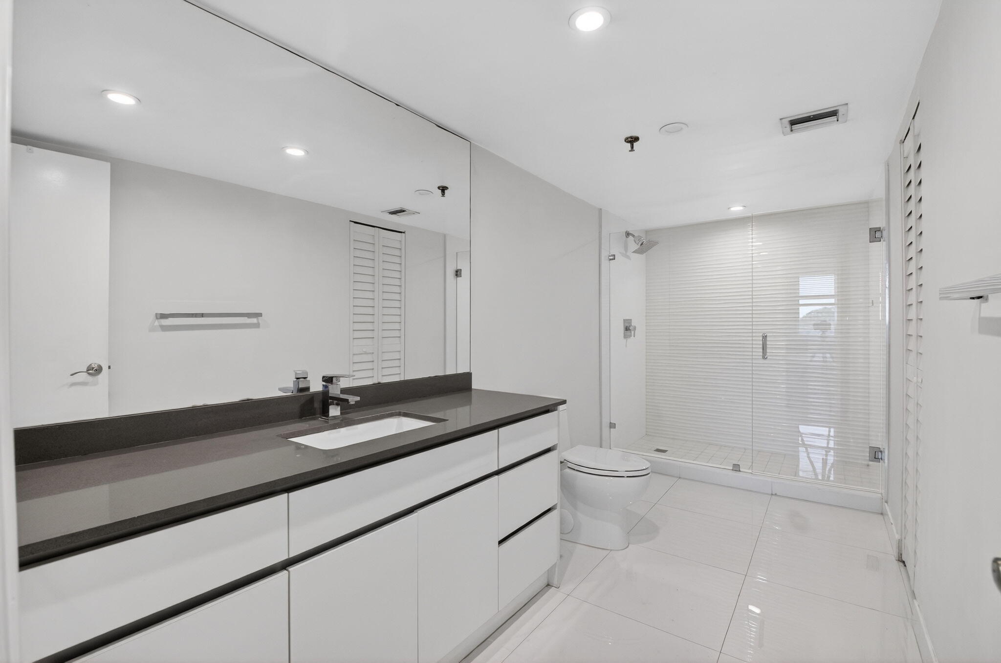 5280 Northwest 2nd Avenue, Unit PH17 Boca Raton, FL 33487 - Photo 17 of 35 17 Primary Bathroom