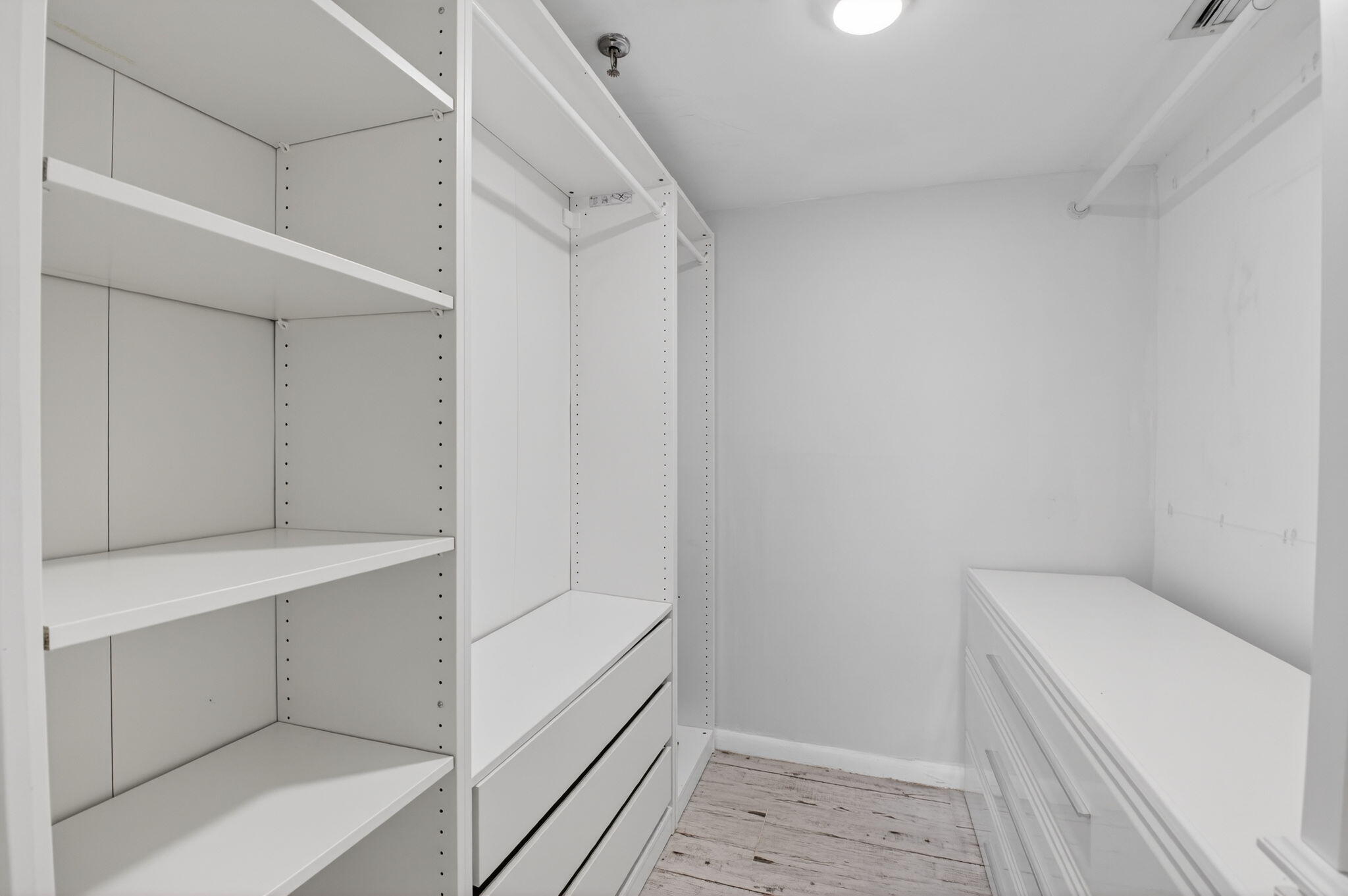 5280 Northwest 2nd Avenue, Unit PH17 Boca Raton, FL 33487 - Photo 18 of 35 18 Primary Closet