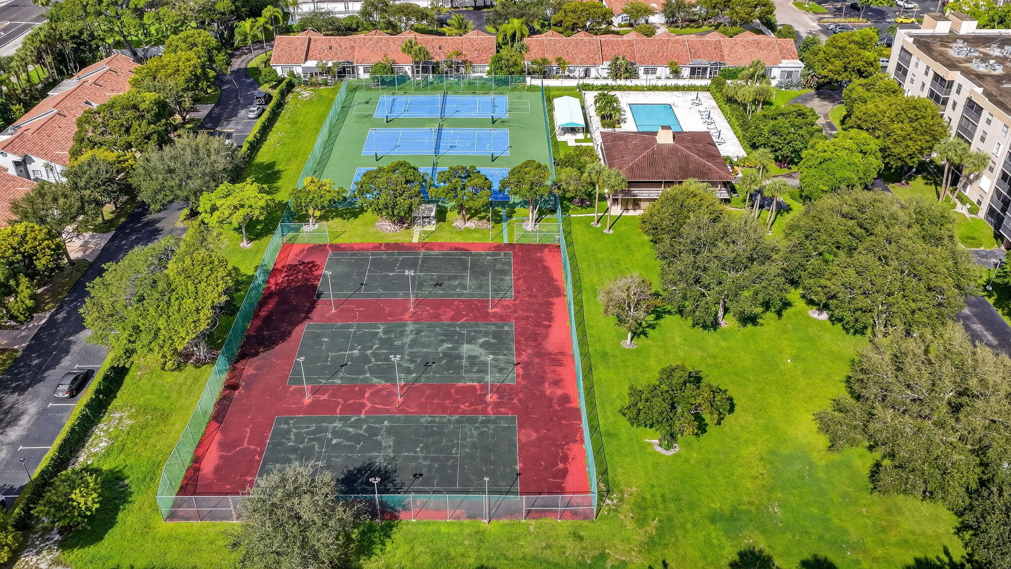 5280 Northwest 2nd Avenue, Unit PH17 Boca Raton, FL 33487 - Photo 34 of 35 34 Tennis-Pool-Clubhouse