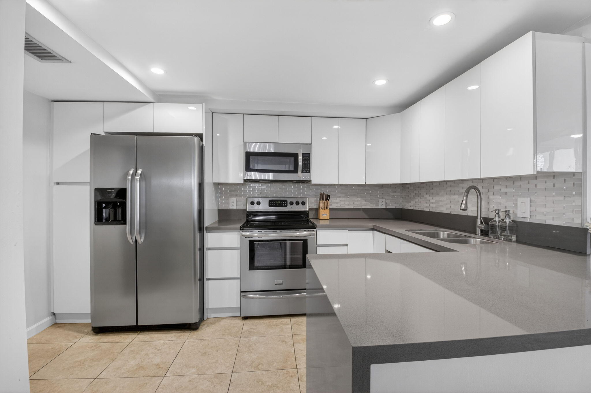 5280 Northwest 2nd Avenue, Unit PH17 Boca Raton, FL 33487 - Photo 10 of 35 10 Kitchen 2