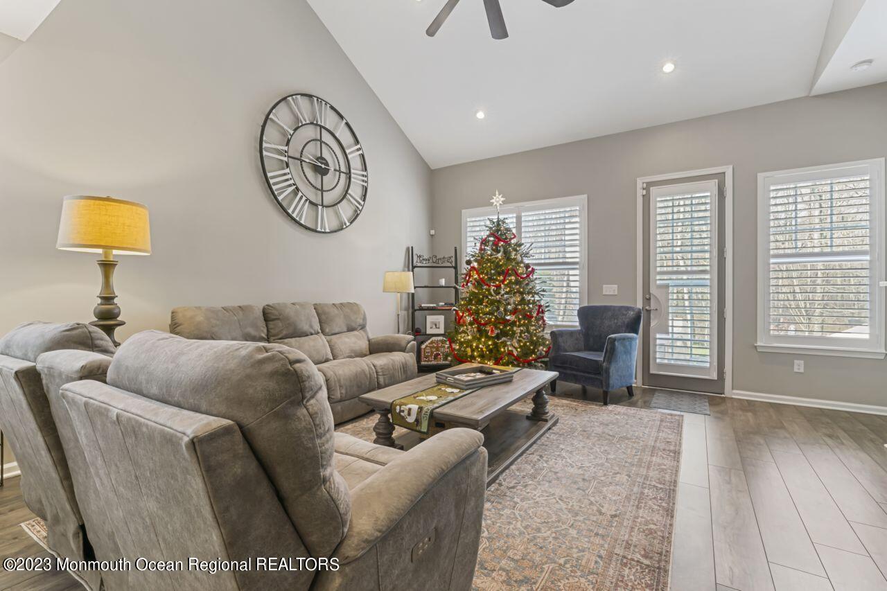 68 Harvest Ridge Road Howell, NJ 07731 - Photo 18 of 45 a living room with furniture and a window