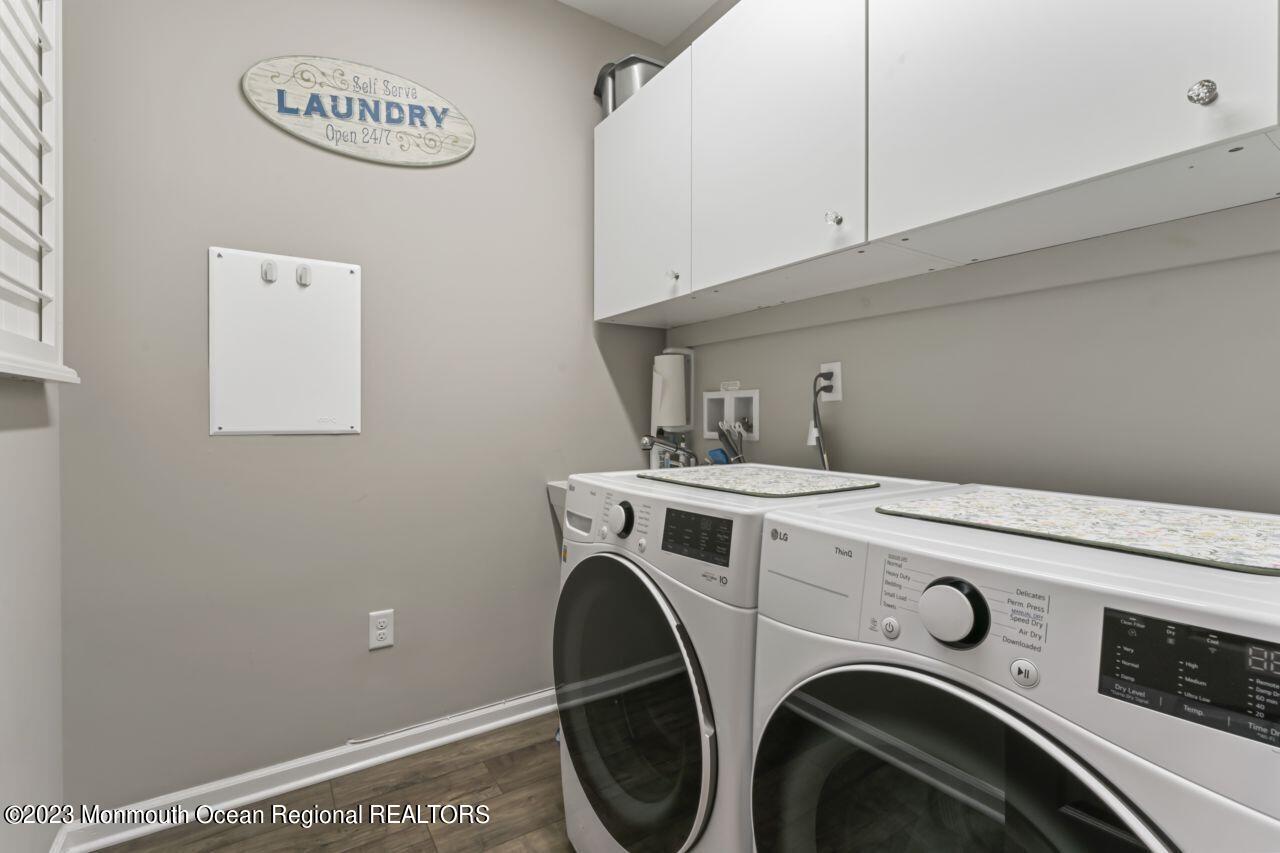 68 Harvest Ridge Road Howell, NJ 07731 - Photo 23 of 45 a utility room with dryer and washer