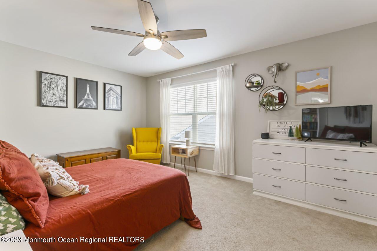 68 Harvest Ridge Road Howell, NJ 07731 - Photo 32 of 45 a bed room with a bed and furniture
